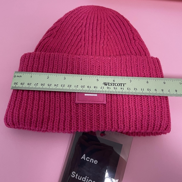 Complete Your Winter Look with a Pink Beanie and Acne Beauty Essentials - Picture 3 of 16